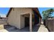 Backyard featuring covered patio, block fence, and access to the gate at 4041 Saguaro Ln, Las Vegas, NV 89110