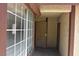 Entryway with windows, a security door and two doors at 4041 Saguaro Ln, Las Vegas, NV 89110