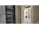Hallway with closet leading to kitchen featuring modern flooring, neutral color and storage at 4041 Saguaro Ln, Las Vegas, NV 89110