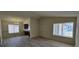 Bright, open-plan living area with new laminate flooring at 4041 Saguaro Ln, Las Vegas, NV 89110