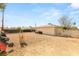 Large backyard featuring a mix of gravel and hardscape, providing flexibility for landscaping and outdoor living at 4201 Sunrise Ave, Las Vegas, NV 89110