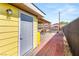 Backyard space with a grey door and brick pathway, great for outdoor activities at 4201 Sunrise Ave, Las Vegas, NV 89110