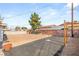Spacious backyard with a mix of gravel and mulch offering a blank slate for customization and landscaping at 4201 Sunrise Ave, Las Vegas, NV 89110