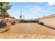Vast backyard with gravel, offering a low-maintenance landscape and endless possibilities for customization and design at 4201 Sunrise Ave, Las Vegas, NV 89110