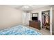 Bedroom view featuring a dresser, closet, and comfortable bed, providing ample space at 4201 Sunrise Ave, Las Vegas, NV 89110