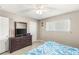 Bedroom featuring a dresser, closet, and comfortable bed bathed in natural light at 4201 Sunrise Ave, Las Vegas, NV 89110