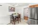 Cozy dining area with an adjacent kitchen and a table that seats four at 4201 Sunrise Ave, Las Vegas, NV 89110