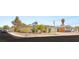 Street view of a cute home with solar panels, tidy landscaping and a single car garage at 4201 Sunrise Ave, Las Vegas, NV 89110