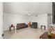 Bright living room with tile floors, neutral walls, ceiling fan and comfortable furniture at 4201 Sunrise Ave, Las Vegas, NV 89110