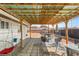 Inviting patio with pergola cover, brick flooring, and outdoor seating perfect for relaxing and entertaining at 4201 Sunrise Ave, Las Vegas, NV 89110
