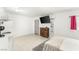 Bright studio apartment with a kitchenette, TV, and comfortable living space at 4201 Sunrise Ave, Las Vegas, NV 89110
