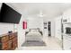 Spacious studio apartment featuring a bed, kitchenette, and ample storage at 4201 Sunrise Ave, Las Vegas, NV 89110