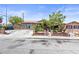 Charming single-story home featuring a well-maintained front yard and a welcoming facade at 4606 Powell Ave, Las Vegas, NV 89121