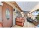 Comfortable covered porch with cushioned seating, offering a relaxing outdoor space at 4606 Powell Ave, Las Vegas, NV 89121