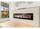 Modern electric fireplace and art installation provide a focal point in this sleek and inviting bedroom at 4856 Fiesta Lakes St, Las Vegas, NV 89130
