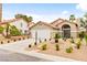 Charming single-story home with a well-manicured front yard, two car garage, and desert landscaping at 4856 Fiesta Lakes St, Las Vegas, NV 89130