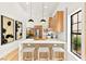 Kitchen with white countertops, wooden cabinets, and pendant lighting over the island at 4856 Fiesta Lakes St, Las Vegas, NV 89130