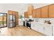 Bright kitchen featuring stainless steel appliances, white cabinets, and modern finishes at 4856 Fiesta Lakes St, Las Vegas, NV 89130
