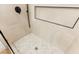 Stylish shower featuring hexagon tile flooring, black hardware, and a built-in niche at 4856 Fiesta Lakes St, Las Vegas, NV 89130