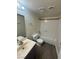 Bathroom features tiled shower-tub combo, modern vanity, and updated fixtures at 4941 Newport Cove Dr # B, Las Vegas, NV 89119