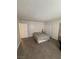 This is a large bedroom with wood floors, a closet with sliding doors, and neutral paint at 4941 Newport Cove Dr # B, Las Vegas, NV 89119