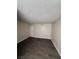 Bedroom showcases wood-look flooring, neutral walls, and plenty of space at 4941 Newport Cove Dr # B, Las Vegas, NV 89119