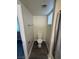 This is a small toilet room with a modern toilet and a window at 4941 Newport Cove Dr # B, Las Vegas, NV 89119