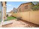 Well-maintained backyard with synthetic grass, perfect for outdoor entertaining at 5674 Moccasin Point St, Las Vegas, NV 89148