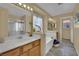Bright bathroom with a soaking tub, double sinks, and separate glass door shower at 6187 Novelty St, Las Vegas, NV 89148