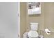 Bathroom area with toilet and storage cabinet at 6187 Novelty St, Las Vegas, NV 89148
