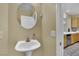 Bathroom area with sink and wall mirror at 6187 Novelty St, Las Vegas, NV 89148