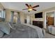 Large bedroom suite with dresser, TV, and walk-in closet at 6187 Novelty St, Las Vegas, NV 89148