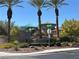 Elegant entrance to Southern Terrace Club featuring landscaping and playground at 6187 Novelty St, Las Vegas, NV 89148
