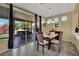 Dining area features sliding glass doors to the backyard and patio at 6187 Novelty St, Las Vegas, NV 89148