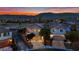 Located near mountains, this beautiful home is complete with a two-car garage, mature landscaping, and privacy fencing at 6187 Novelty St, Las Vegas, NV 89148