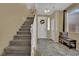 Foyer with carpeted stairs and tiled floor at 6187 Novelty St, Las Vegas, NV 89148