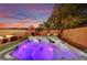 Enjoy this backyard hot tub complete with integrated jets, custom lighting, and plenty of seating at 6187 Novelty St, Las Vegas, NV 89148