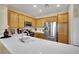 Bright kitchen featuring stainless steel appliances, white countertops, and ample storage at 6187 Novelty St, Las Vegas, NV 89148