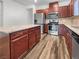 Well-equipped kitchen featuring stainless steel appliances, granite counters, and ample cabinet space at 6312 Conlon St, North Las Vegas, NV 89081