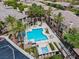 Aerial view of the sparkling community pool and amenities at 664 Peachy Canyon Cir # 103, Las Vegas, NV 89144