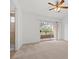 Bright bedroom with ceiling fan, private balcony and ensuite bathroom access at 664 Peachy Canyon Cir # 103, Las Vegas, NV 89144