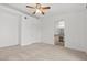 Spacious bedroom with ceiling fan and ensuite bathroom access at 664 Peachy Canyon Cir # 103, Las Vegas, NV 89144