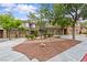 Exterior of a multi-Gathering home with garages and low-maintenance front yard at 664 Peachy Canyon Cir # 103, Las Vegas, NV 89144