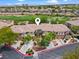 Beautiful exterior view of a multi-Gathering home with garages and manicured landscaping at 664 Peachy Canyon Cir # 103, Las Vegas, NV 89144
