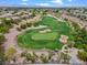 Scenic aerial view of the lush golf course and surrounding community at 664 Peachy Canyon Cir # 103, Las Vegas, NV 89144