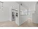 Open-concept living area with tile flooring, neutral color palette, and lots of natural light at 664 Peachy Canyon Cir # 103, Las Vegas, NV 89144
