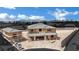 New construction home showing wood framing and a detached garage in a desert setting with city views at 7118 Painted Skyline St, Las Vegas, NV 89118