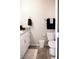 Well-lit bathroom featuring modern fixtures, granite countertop, and neutral color scheme at 7411 Sunray Point St, North Las Vegas, NV 89084