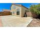 Spacious backyard with concrete patio and stucco walls for privacy at 7521 Reindeer Ct, Las Vegas, NV 89147