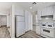 Bright kitchen featuring white cabinets and gas range at 7521 Reindeer Ct, Las Vegas, NV 89147